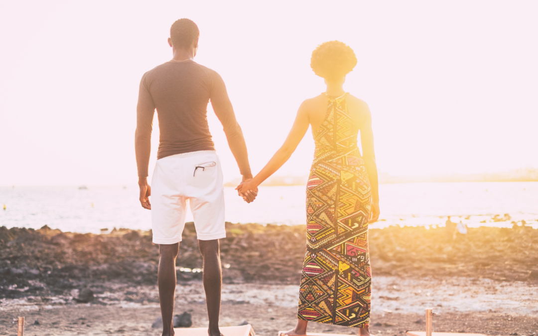 Mindful Couple Looking out at water at sunset